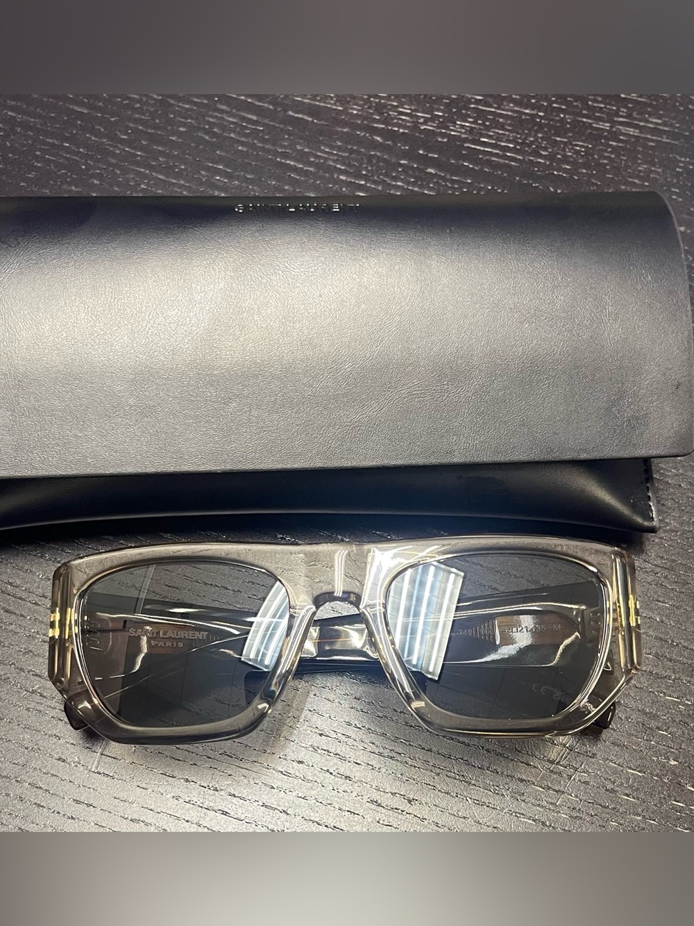Saint Laurent Men's Transparent Gray Frame Sunglasses with Dark Lenses